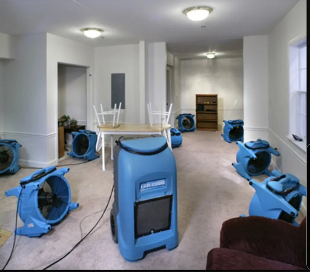 Air movers and dehumidifier setup for Water Damage Restoration in Norco
